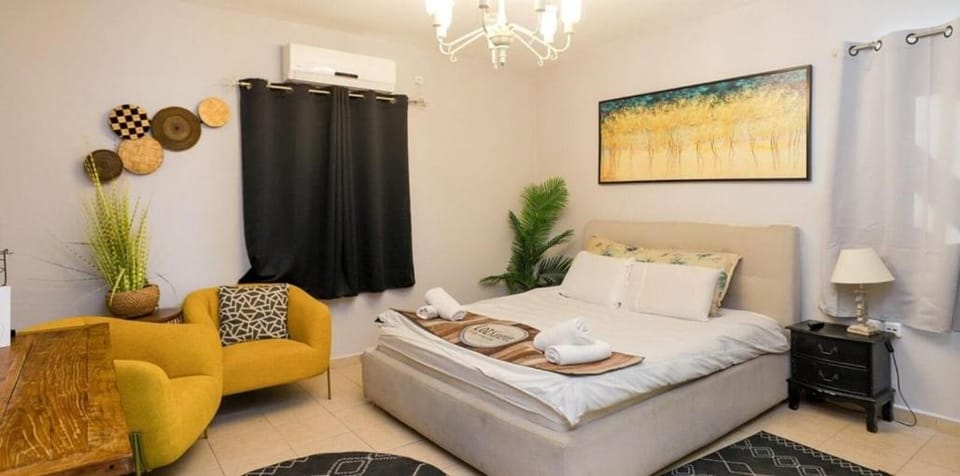 Bed, Living room, Seating area, Bedroom, air conditioner