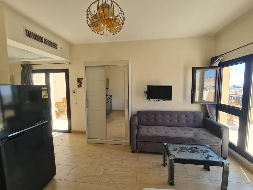 TV and multimedia, Living room, Seating area, air conditioner