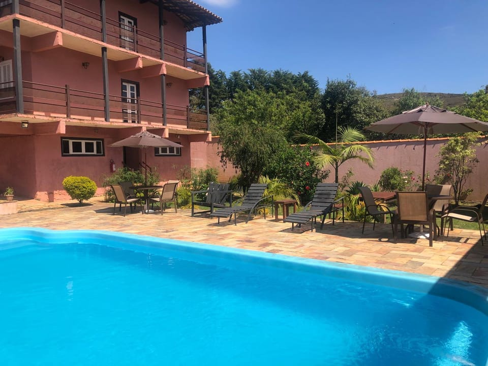 Property building, Garden, Pool view, Swimming pool, sunbed