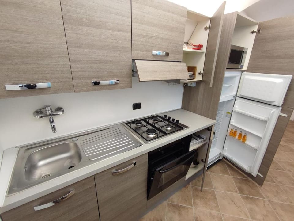 Kitchen or kitchenette, stove