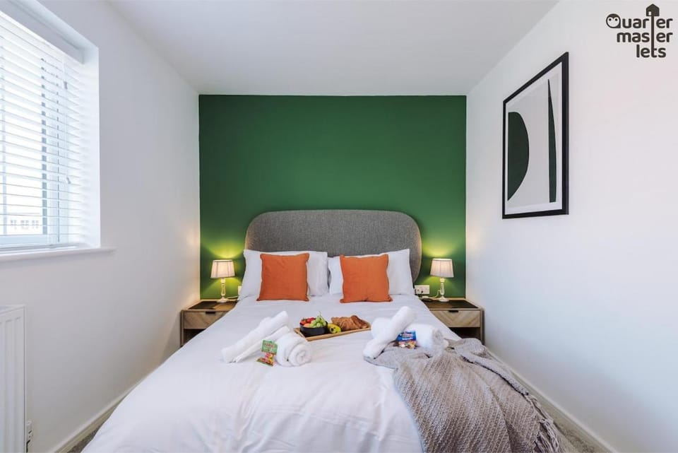 Bed, Decorative detail, Seating area, Bedroom, Garden view, furniture, heating, storage, towels, wardrobe, laundry