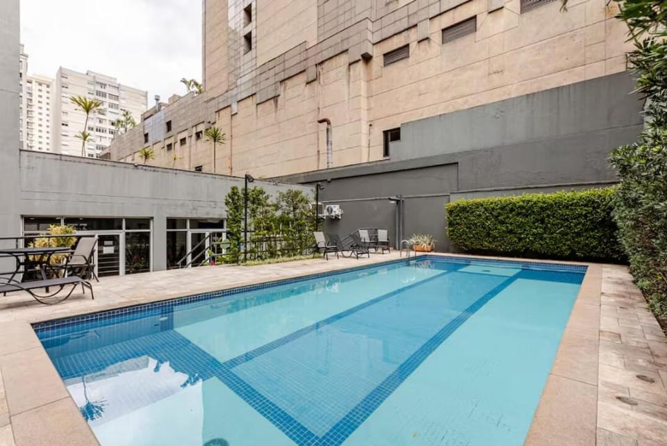 Property building, Day, Pool view, Swimming pool, sunbed
