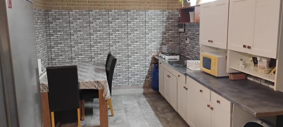 Kitchen or kitchenette, oven, stove
