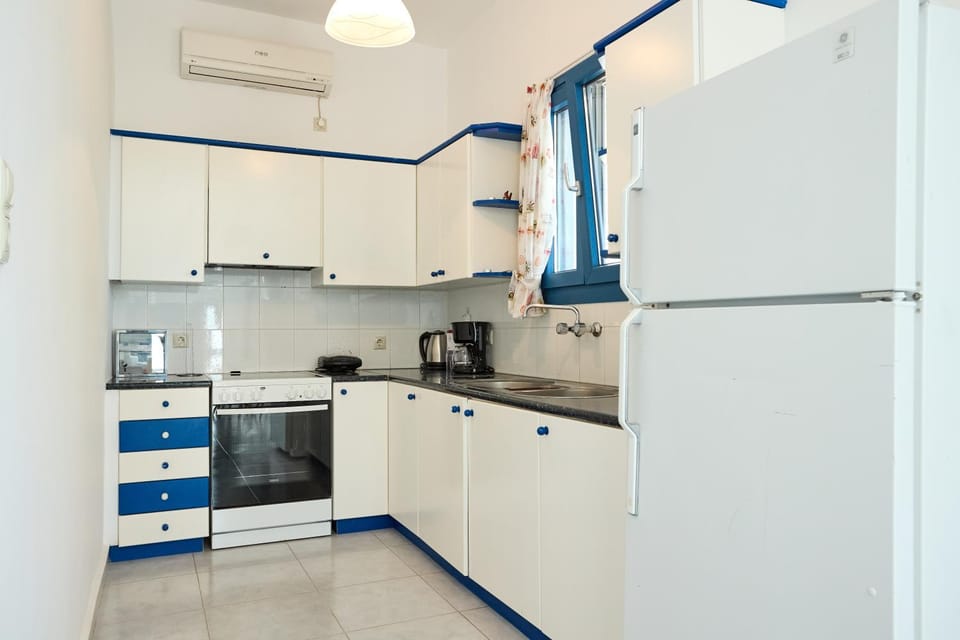 Kitchen or kitchenette, oven, stove, toaster