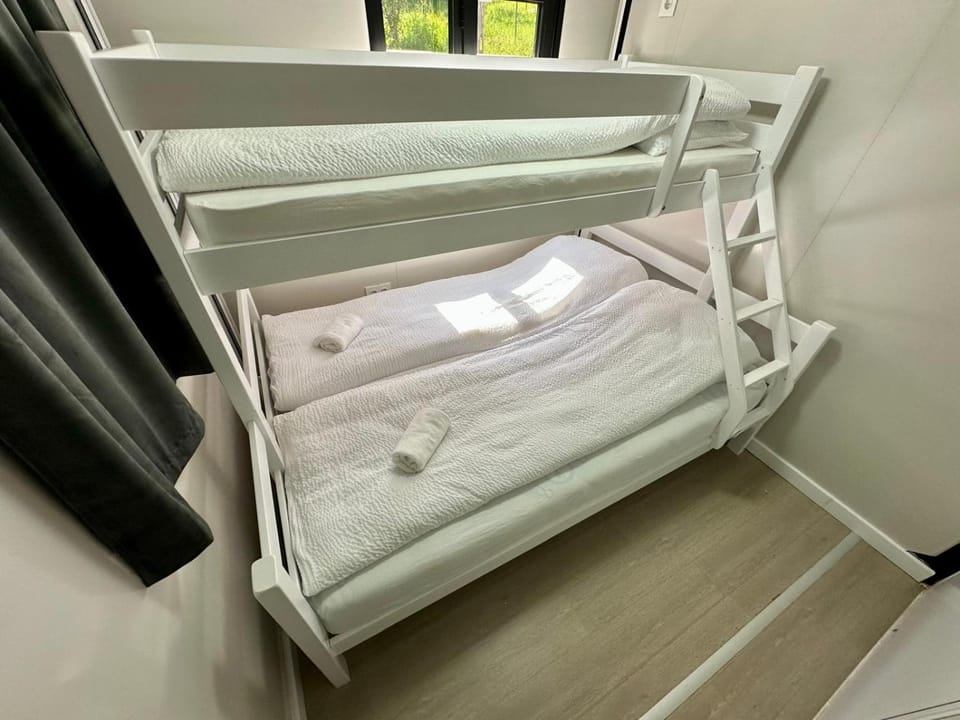 Bed, Photo of the whole room, Bedroom, cot, bunk bed, towels