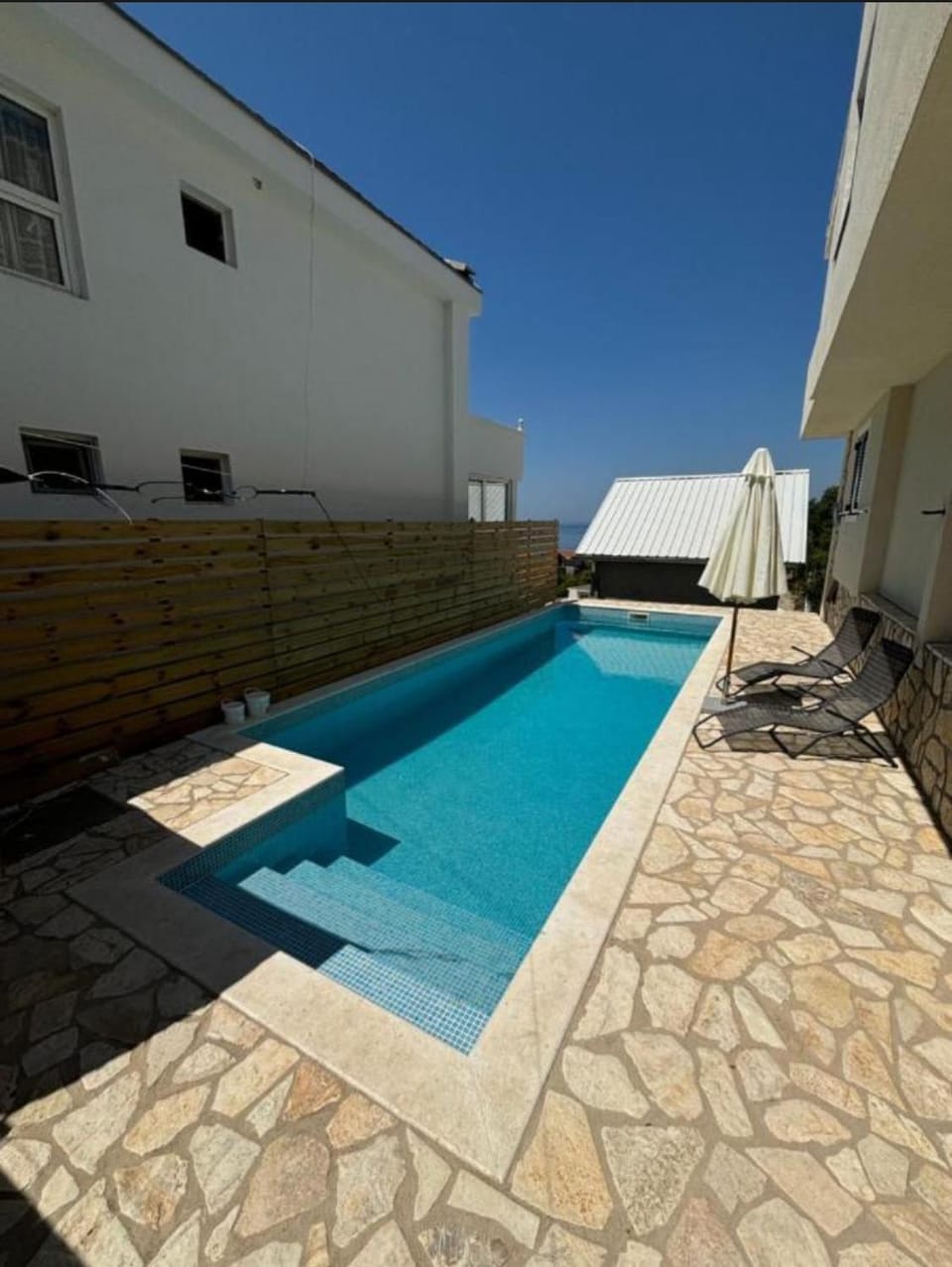 Swimming pool, sunbed