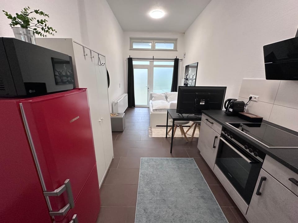 Kitchen or kitchenette, microwave