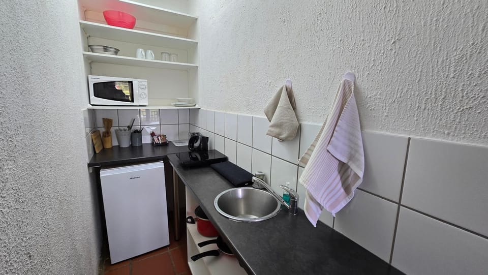 Kitchen or kitchenette, stove, toaster