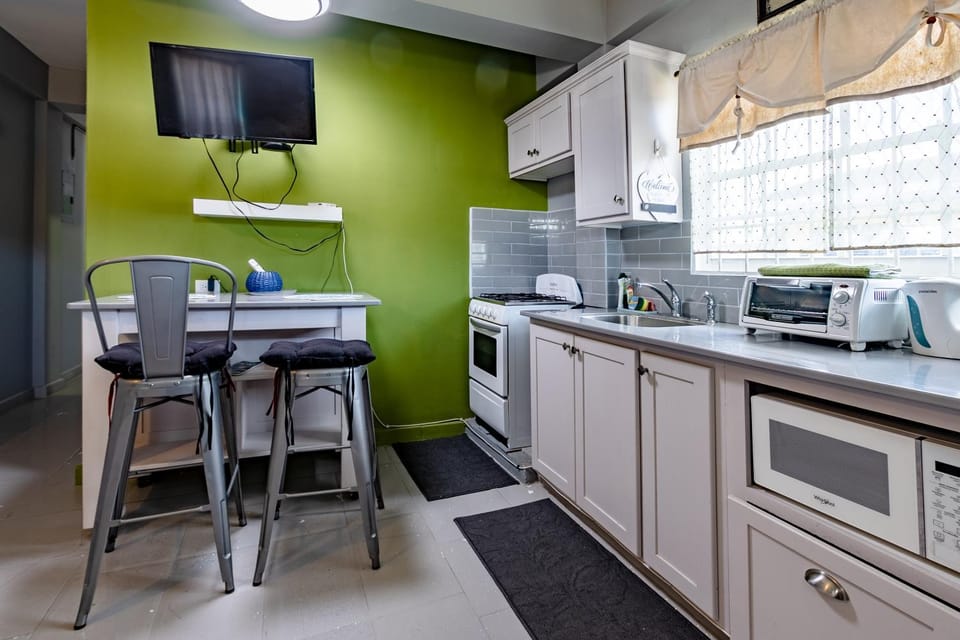 Kitchen or kitchenette, oven, stove