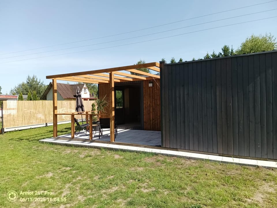 Domek letniskowy Osieki Parkowa House in West Pomeranian Voivodeship, Poland