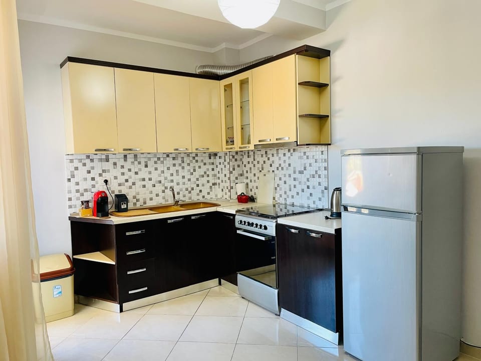 Kitchen or kitchenette, oven, stove
