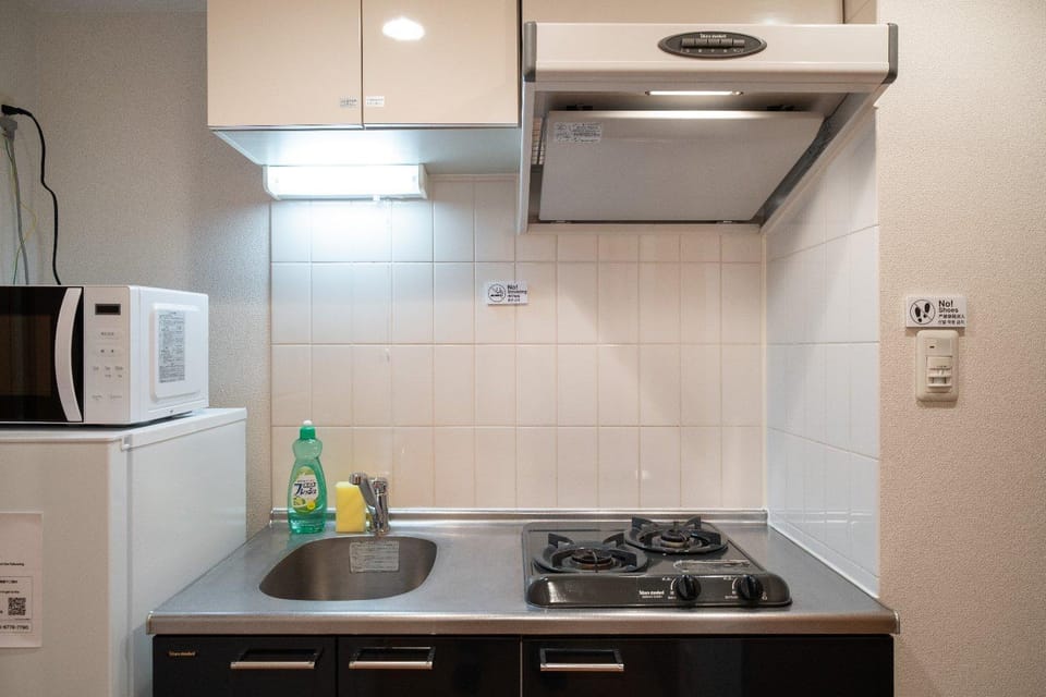 Kitchen or kitchenette, stove