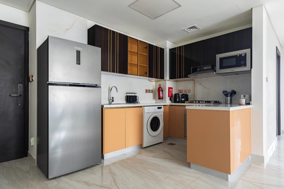 Coffee/tea facilities, Kitchen or kitchenette, oven, stove, toaster, washing machine