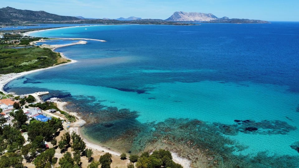 Nearby landmark, Day, Natural landscape, Beach, Mountain view