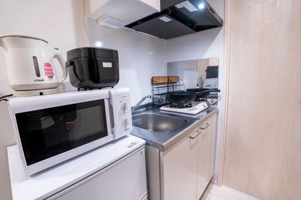 Kitchen or kitchenette, stove