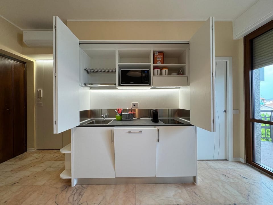 Kitchen or kitchenette, stove