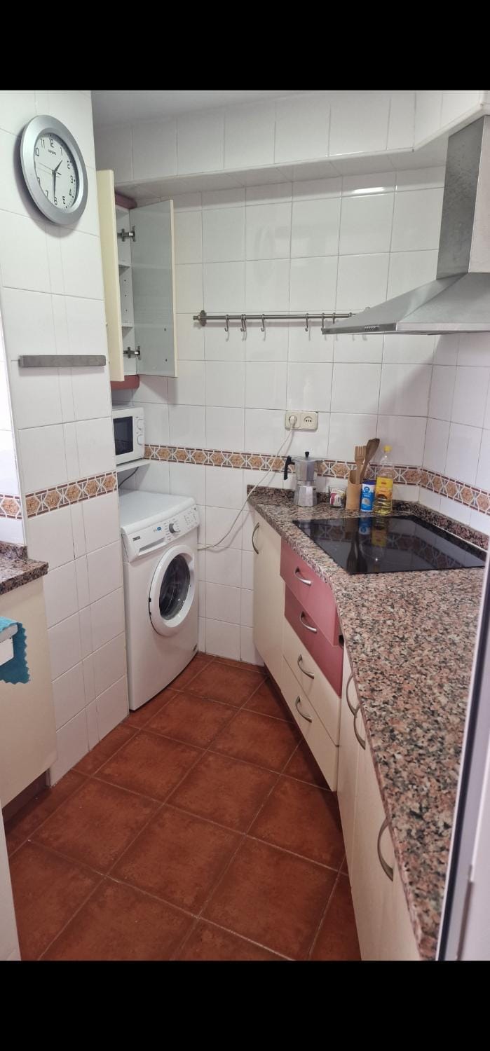 Kitchen or kitchenette, oven, washing machine