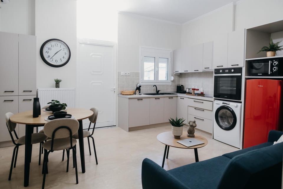 Kitchen or kitchenette, Living room, Seating area, Dining area, oven, stove, washing machine, dryer