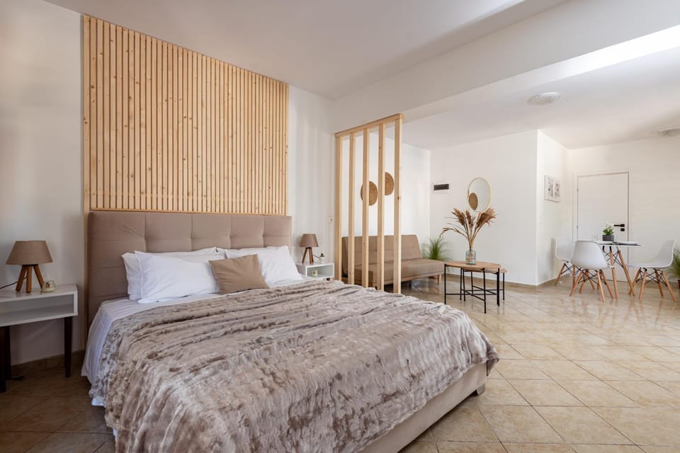 Bed, Living room, Seating area, Bedroom
