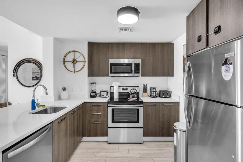 Kitchen or kitchenette, dishwasher, oven, stove, toaster