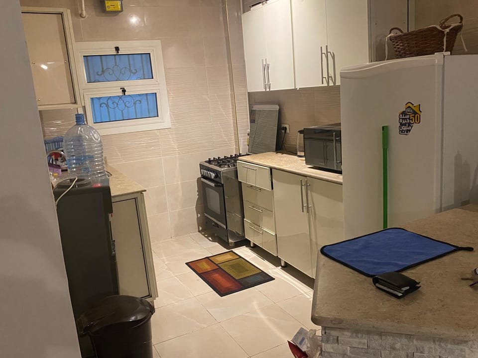 Kitchen or kitchenette, oven, stove
