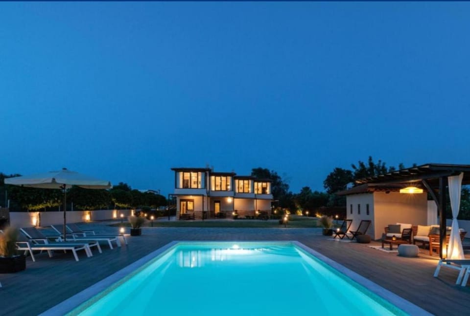 Property building, Night, Pool view, Swimming pool