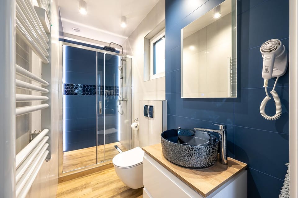 Shower, Bathroom, hair dryier, towels, towels