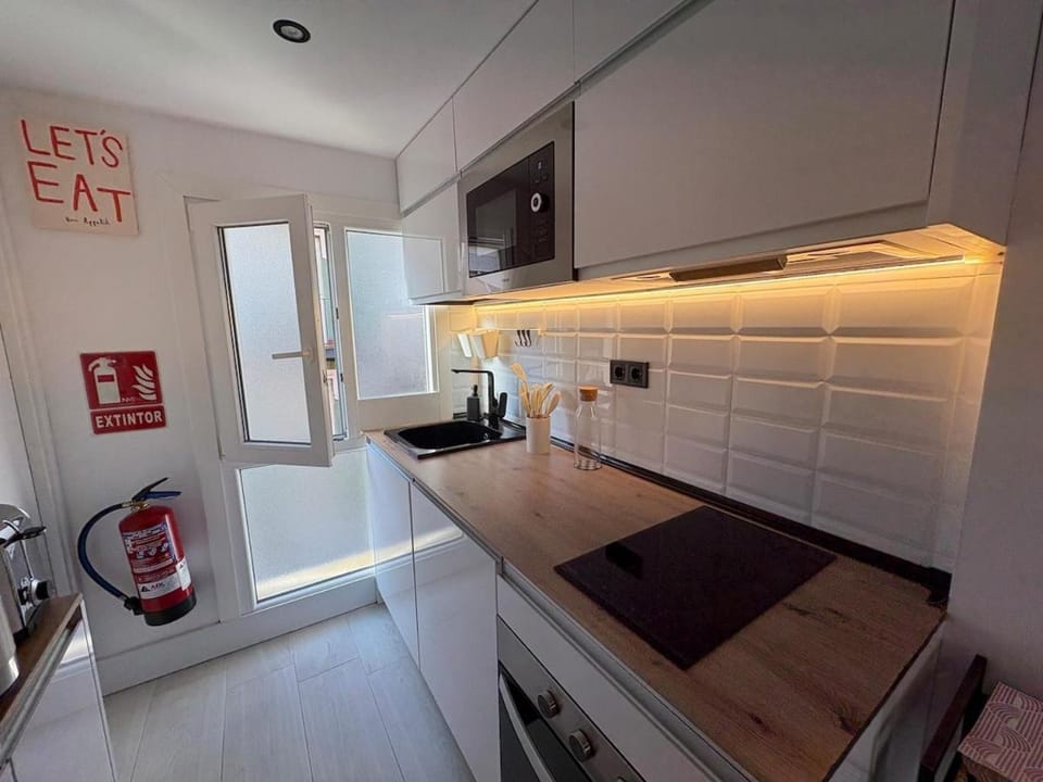 Kitchen or kitchenette, oven, stove, toaster