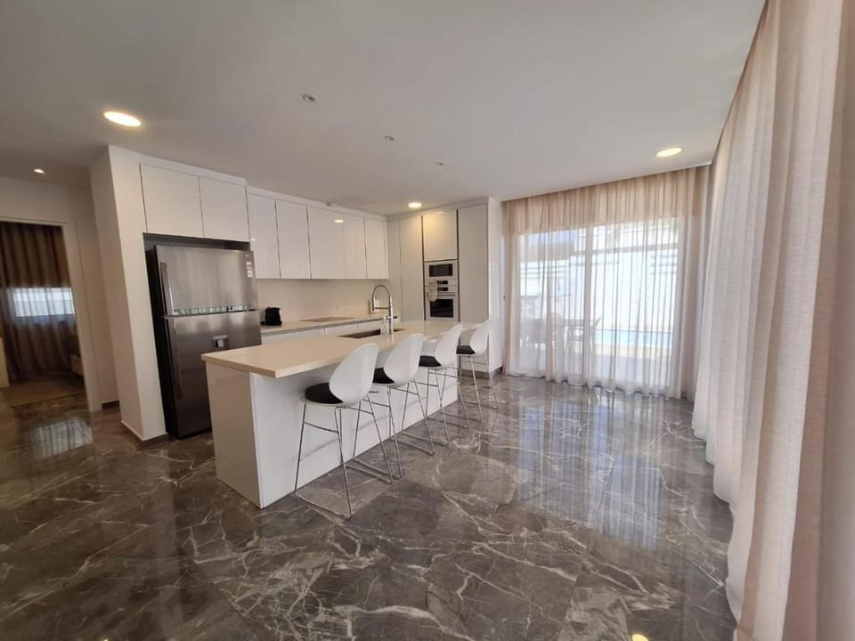 Kitchen or kitchenette, oven, stove