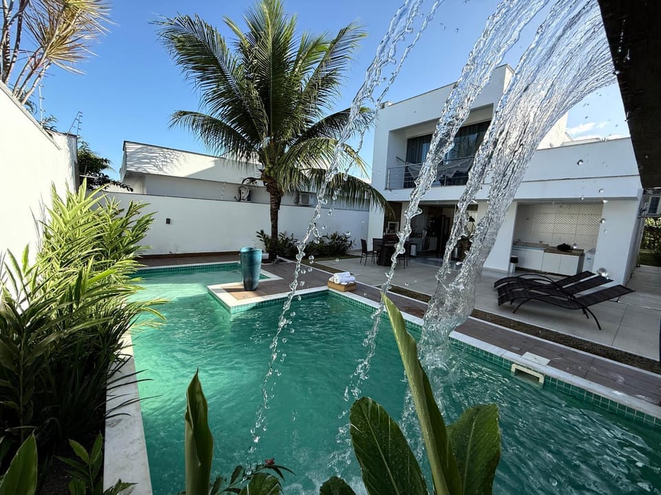 Property building, Patio, Day, Natural landscape, Pool view, Swimming pool, sunbed