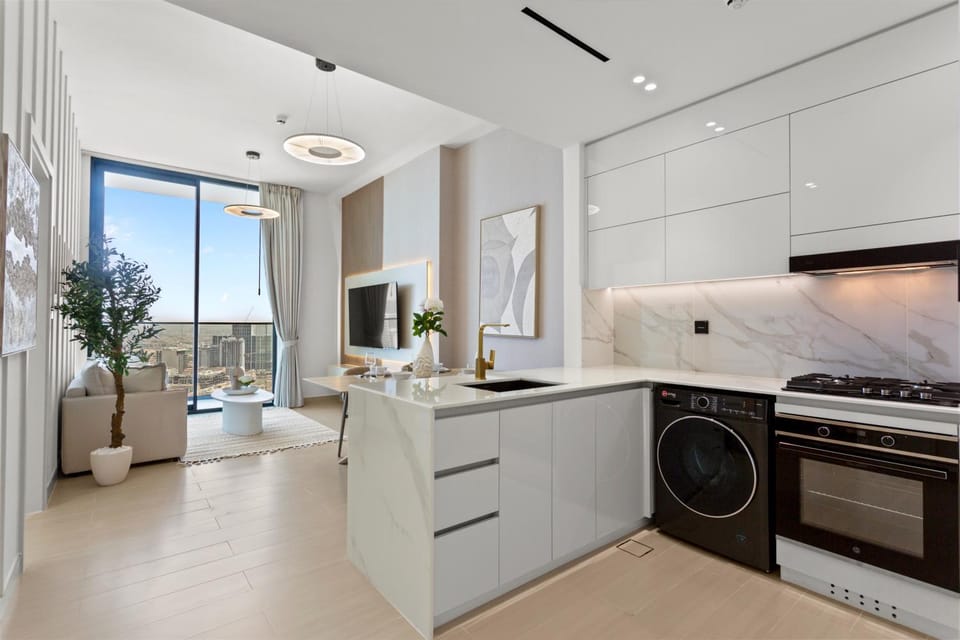 Kitchen or kitchenette, oven, stove, toaster, washing machine