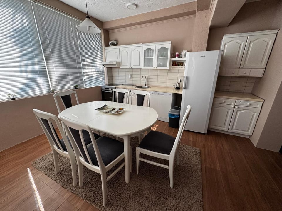 Dining area, dishwasher, oven, stove