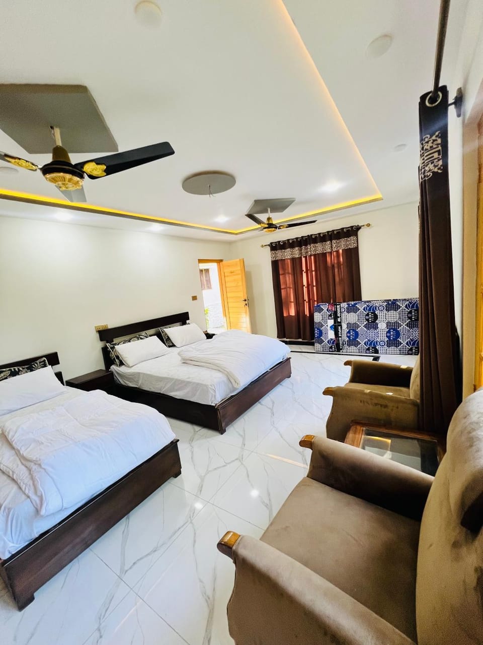 Bed, Living room, Seating area, Bedroom
