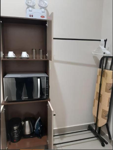 Coffee/tea facilities, flat iron, microwave, wardrobe