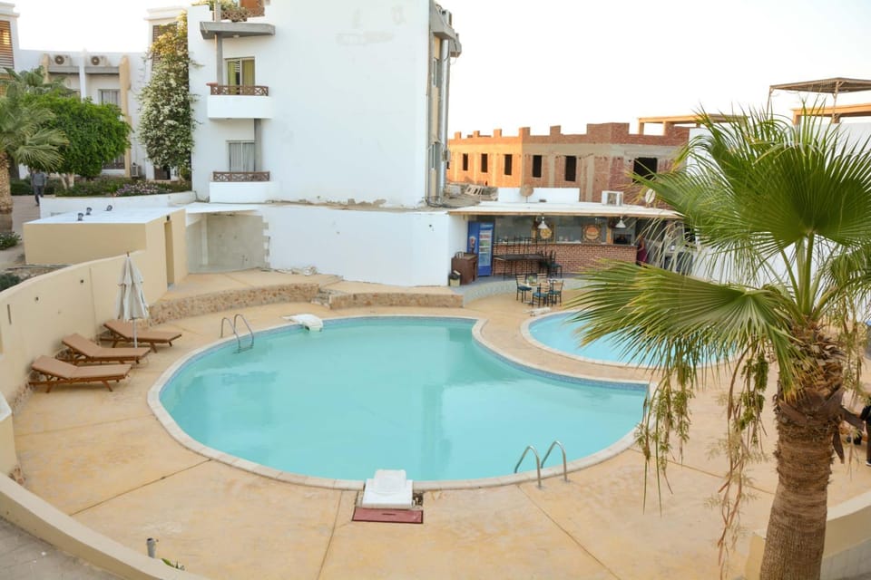 Property building, Day, Pool view, Swimming pool
