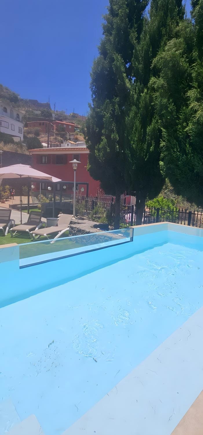 Property building, Living room, Swimming pool