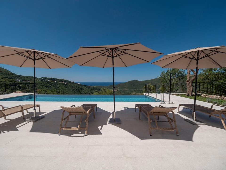 Patio, Day, Natural landscape, Pool view, Swimming pool, sunbed