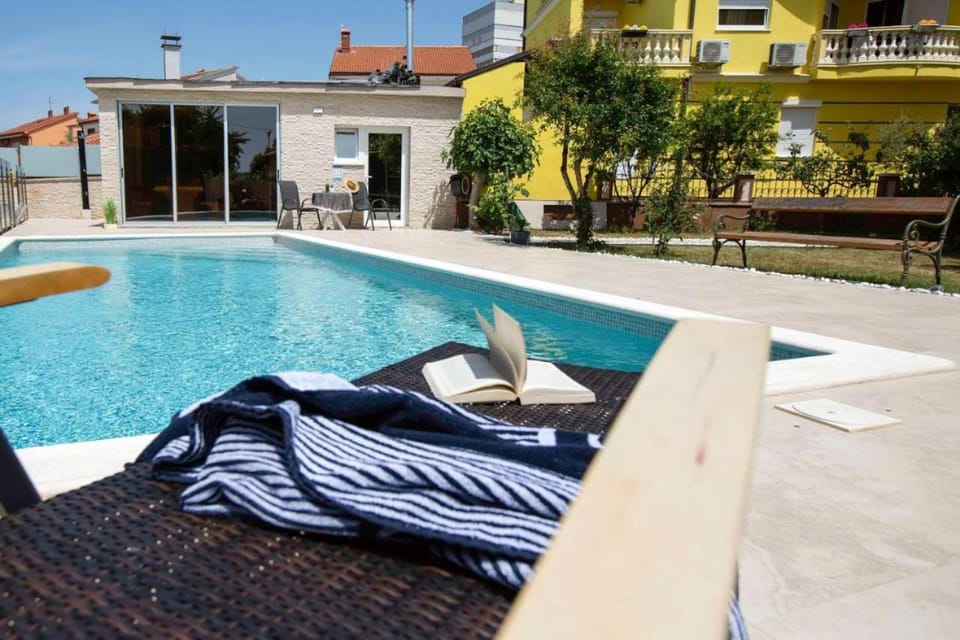 Property building, Seating area, Swimming pool, Swimming pool