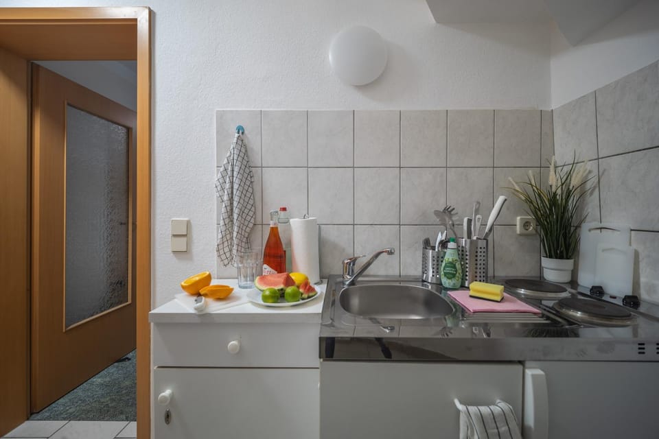 Kitchen or kitchenette, stove