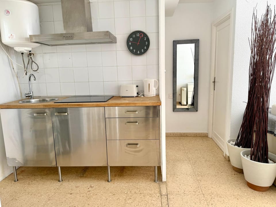 Kitchen or kitchenette, stove