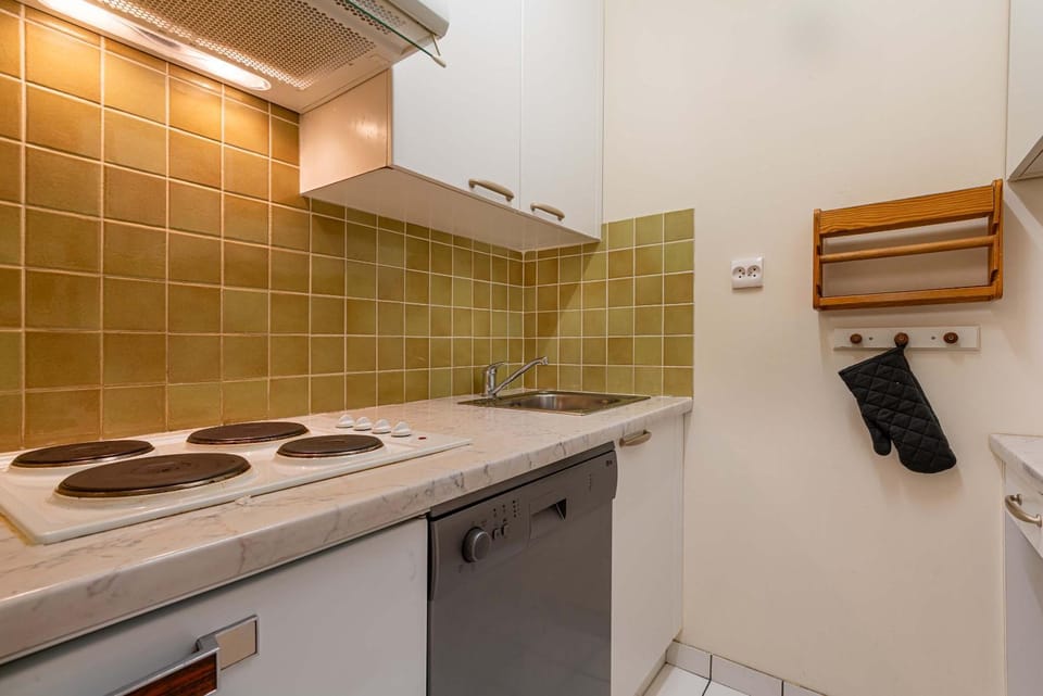 Kitchen or kitchenette, stove