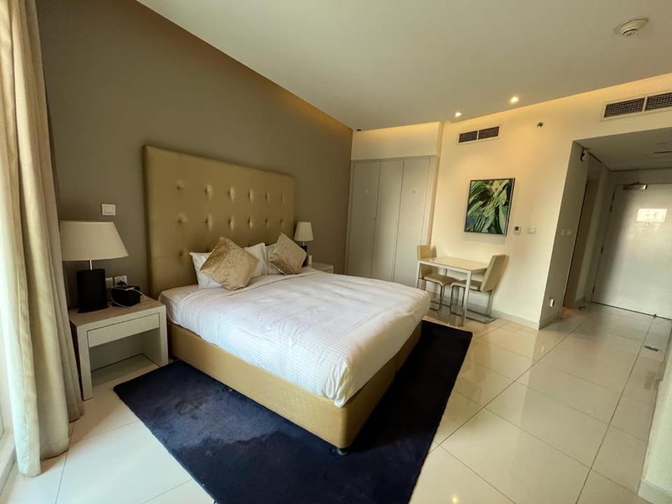 Blue Ocean Holiday Homes - Damac Voleo Apartment in Dubai