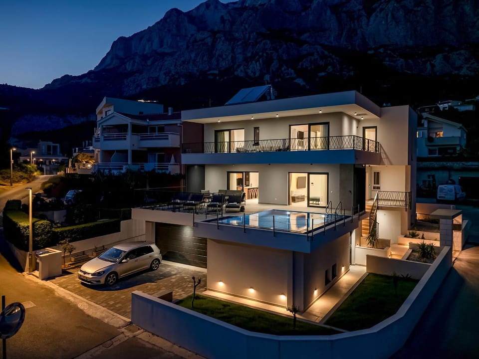 Property building, Night, Natural landscape, Mountain view, Pool view, Swimming pool, Parking