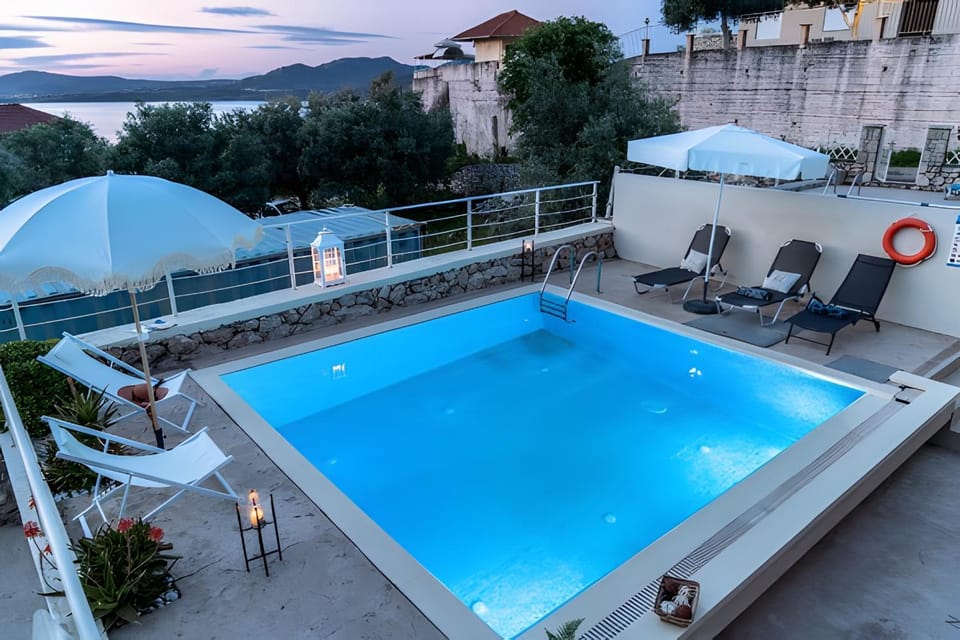 Property building, Living room, Swimming pool
