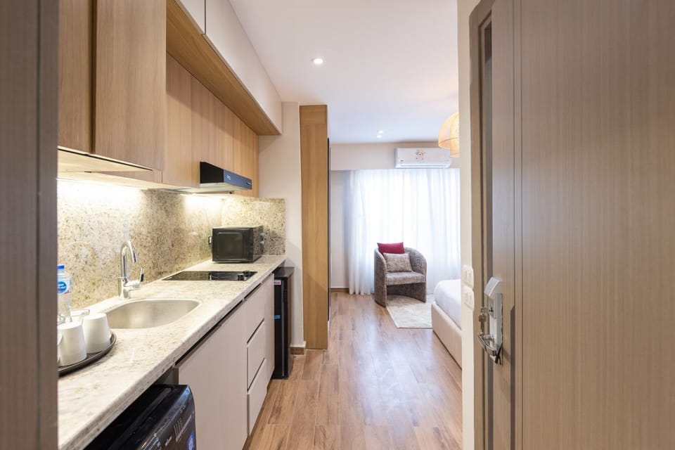 Kitchen or kitchenette, microwave, oven, stove