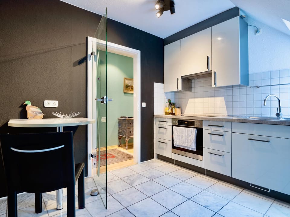 Kitchen or kitchenette, oven, stove