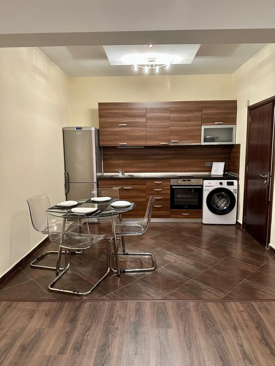 Kitchen or kitchenette, Dining area, oven, stove, washing machine
