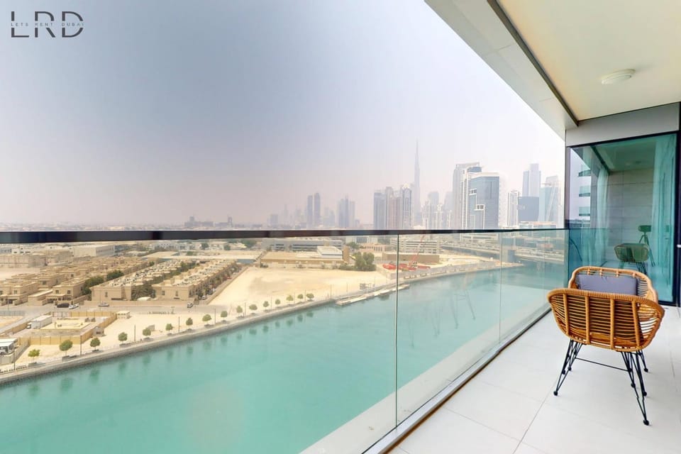 Elegant 2BR with Maids and Stunning Canal Views Apartment in Dubai
