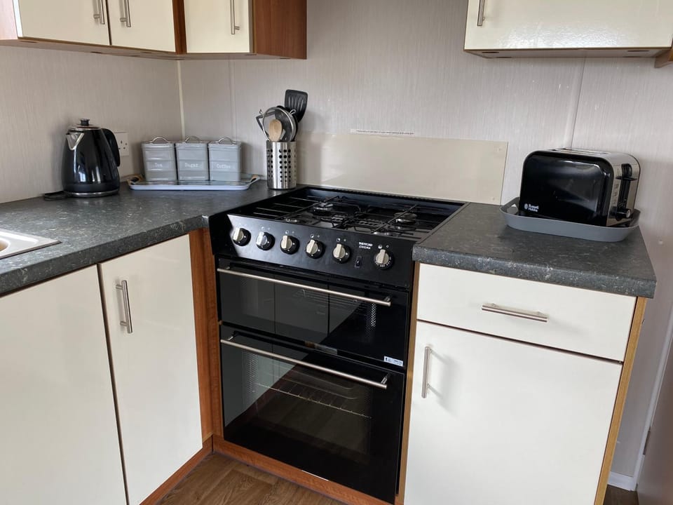 Kitchen or kitchenette, stove