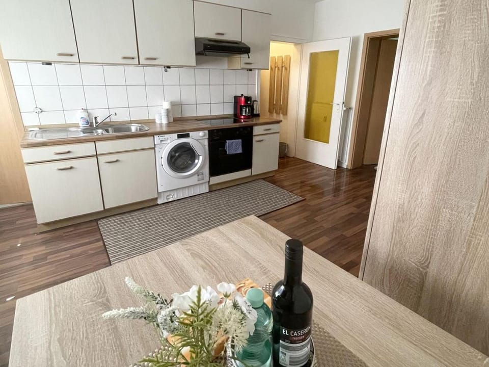 Kitchen or kitchenette, Dining area, oven, stove, washing machine